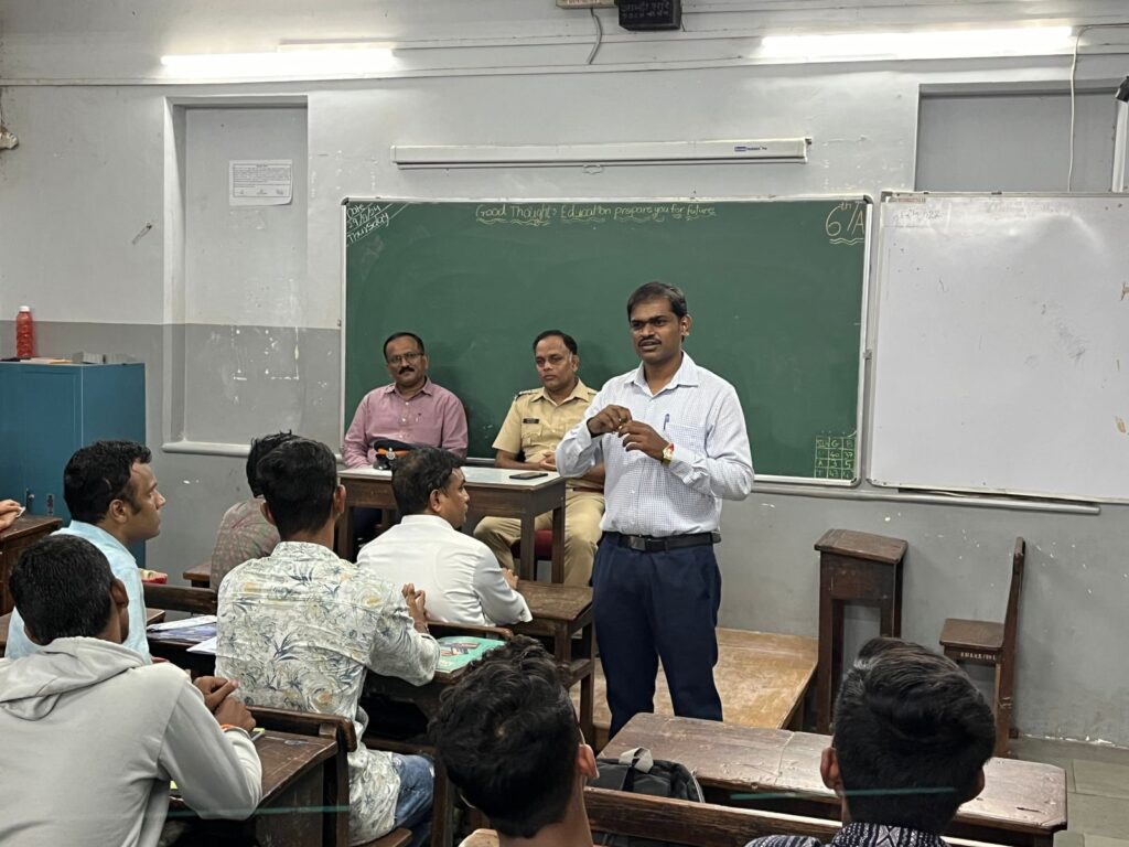 Programme officer Prof. Sandeep Kajabe explaining the purpose of the lecture.